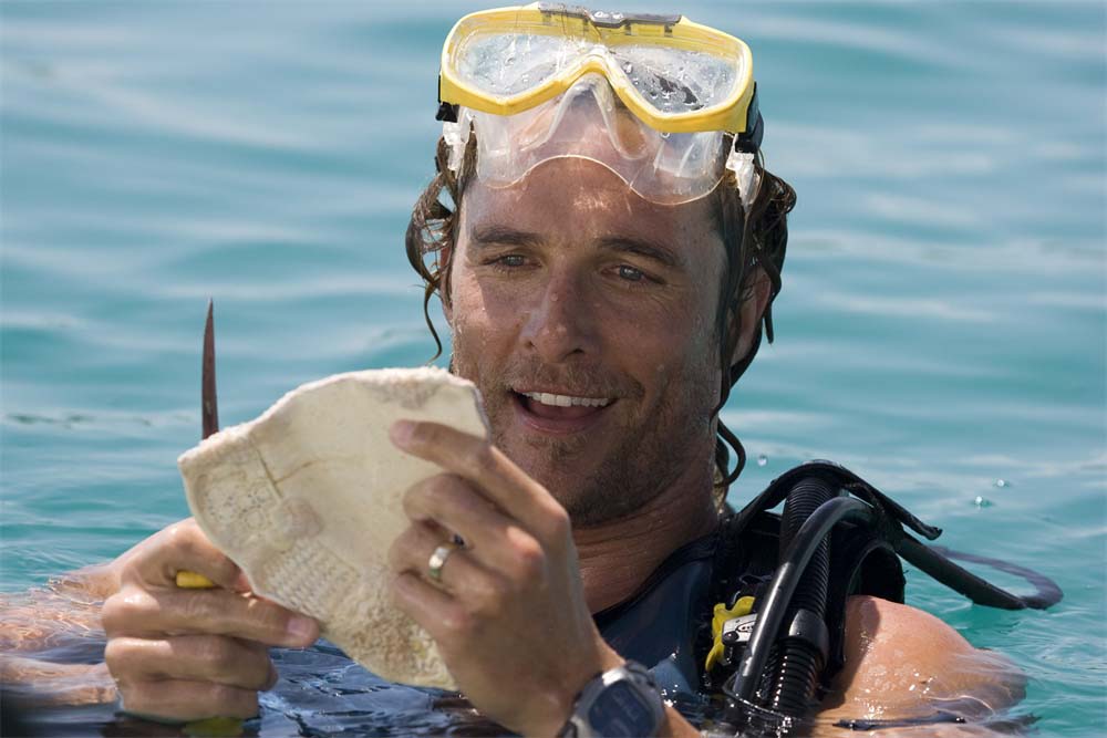 Matthew McConaughey swimming in the water